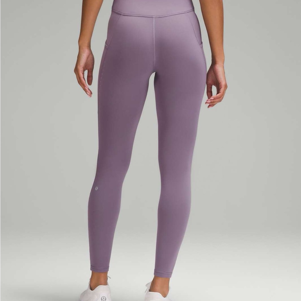 Lululemon Fast and Free High-Rise Fleece Tight 28" with pockets. Size 4